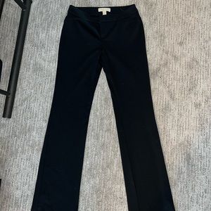 Michael Kors black boot cut business pant. Size 4 Regular. 4 pockets.